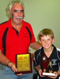 Moonee Valley Bowling champion Will Blair with his competition trophy is joined by MVCC president and NWMCA junior official Charlie Walker with the Club's premiership plaque. Moonee Valley Bowling champion Will Blair with his competition trophy is joined by MVCC president and NWMCA junior official Charlie Walker with the Club's premiership plaque.